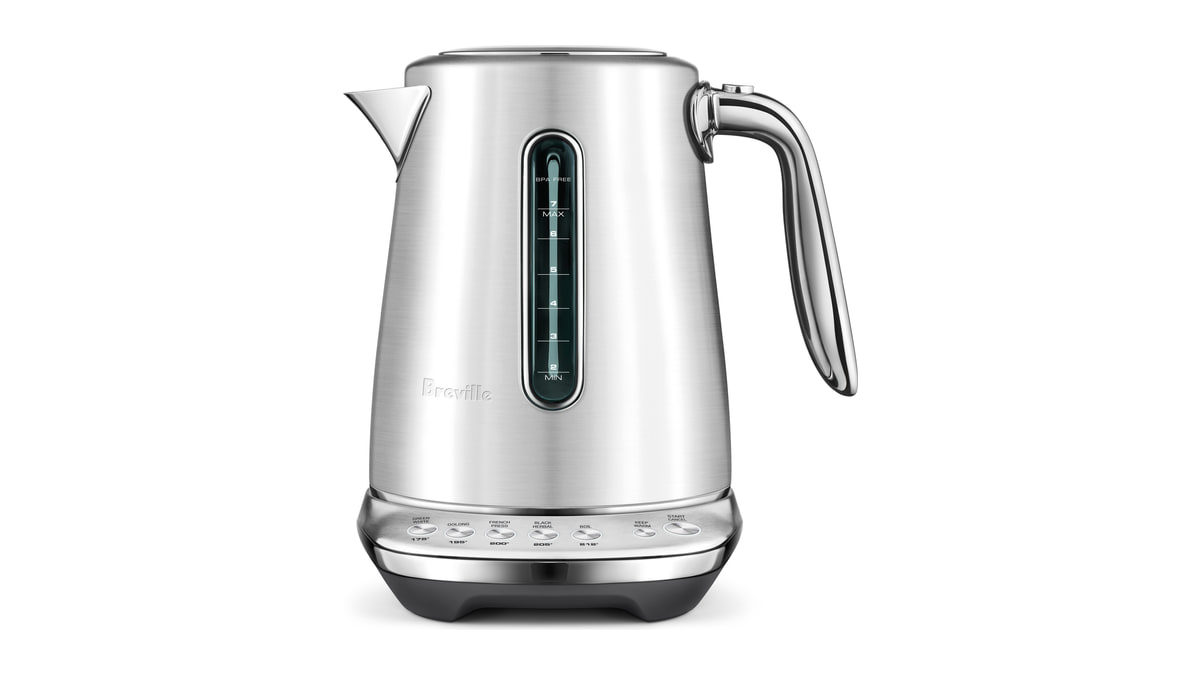Stainless steel Breville kettle with a polished handle, water level window, and temperature buttons on its base.