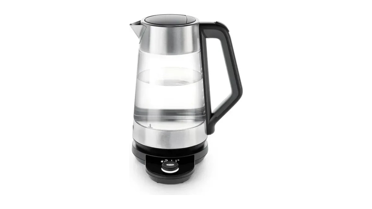 OXO glass kettle with stainless steel trim, black handle, and temperature control base on a white background.