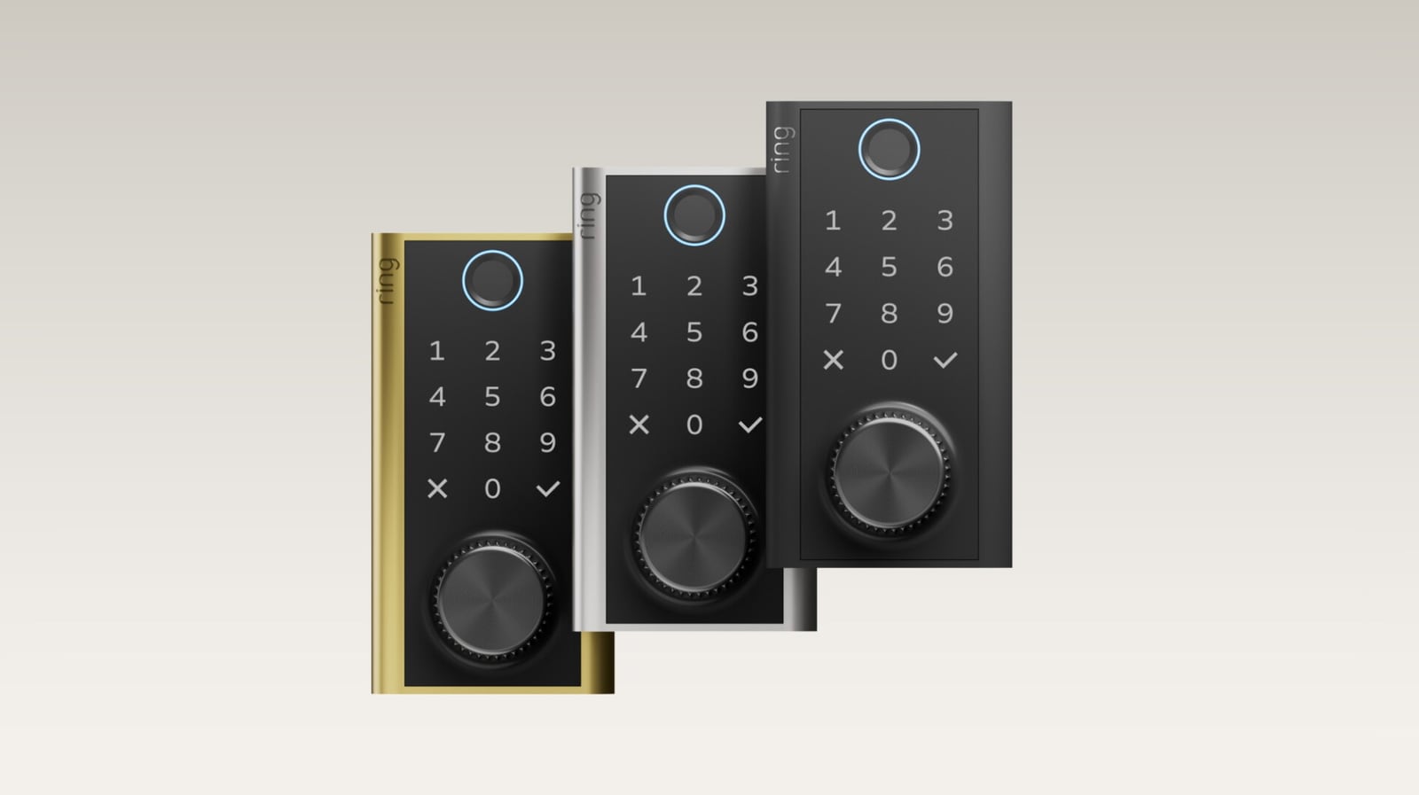 Three Ring smart locks in brass, silver and black finishes with keypads and large circular dials.